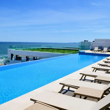 Sea Reflections In Infinity Pool & *